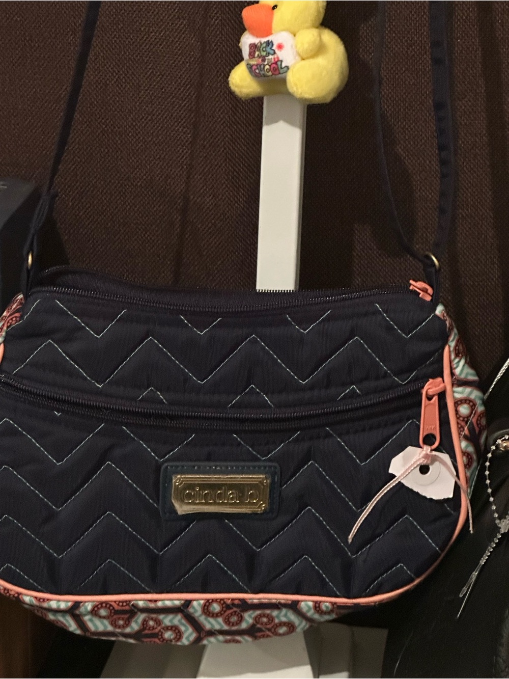 Cinda B Navy Quilted Crossbody Bag with Coral Trim
